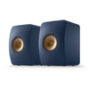 Pair of blue speakers with gold accents, KEF LS50 Meta Bookshelf Speakers